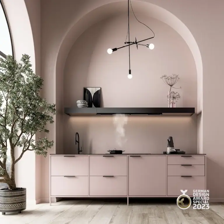Falmec wall hood in a pink arched kitchen, German Design Award