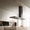 almec hood Elle Island 180 Black above a marble island in a contemporary white kitchen