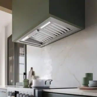 Falmec hood Built-In Plus Pro 80 installed in a green country-style kitchen with marble splashback