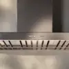 Falmec Marte Pro 90 Inox control panel detail with professional baffle filters and dynamic LED