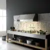 Falmec hood Zeus Pro 120 Inox installed in industrial-style kitchen with white tile backsplash and professional cooktops