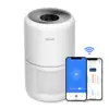 Levoit air purifier Core 300S white tower with VeSync app on phone