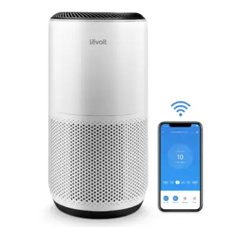 Levoit air purifier Core 400S white tower with VeSync app on phone