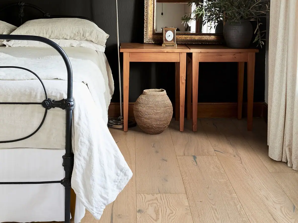 Kährs wide plank flooring in a bedroom