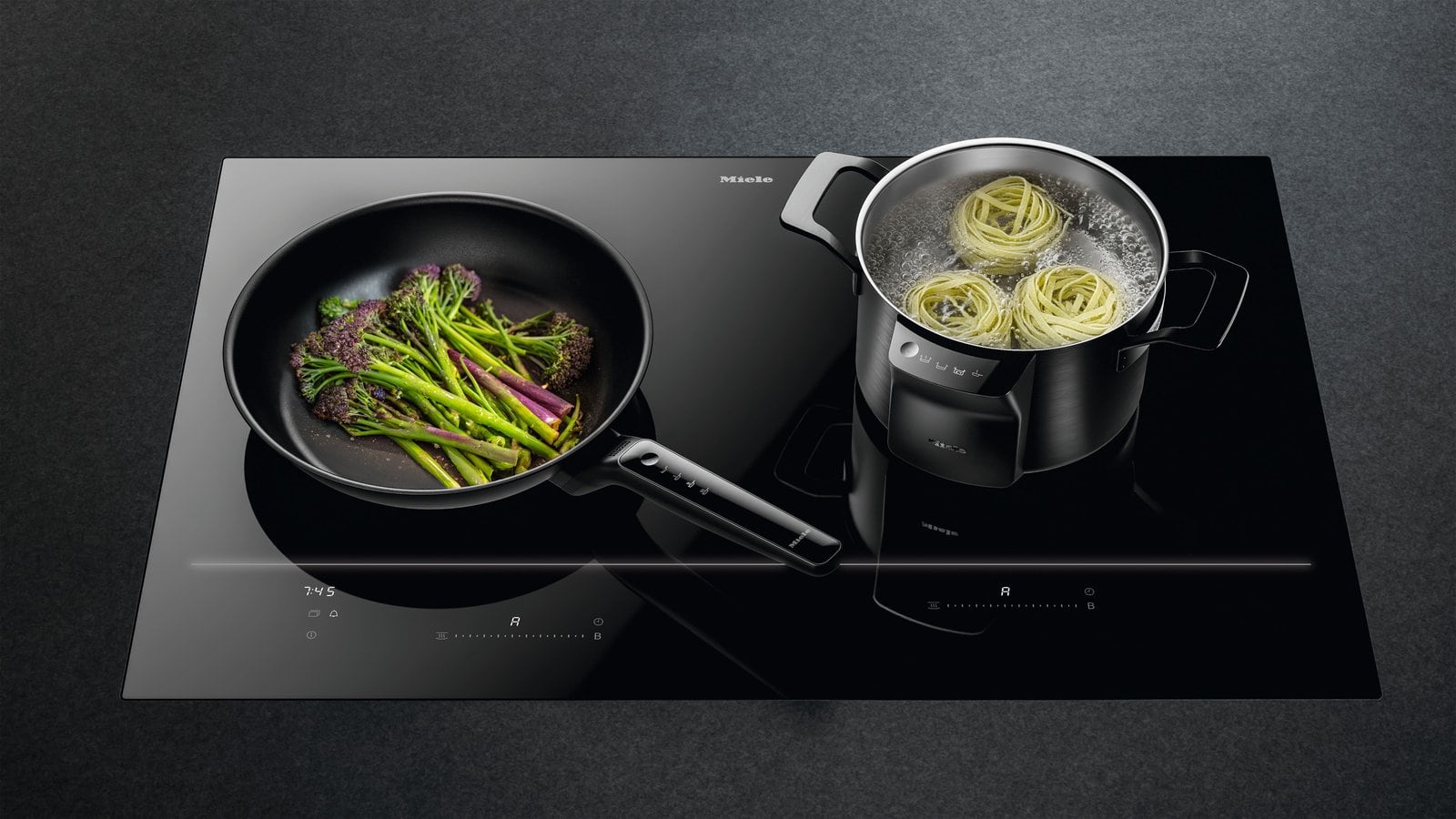 Miele KM 8000 induction hob with M Sense cookware