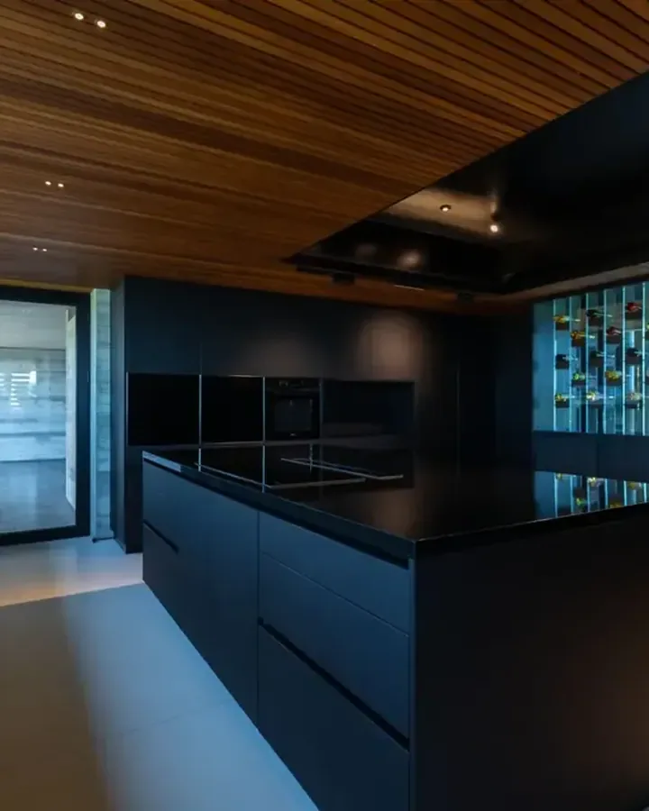 Dark kitchen with a wood slat ceiling, Berbara