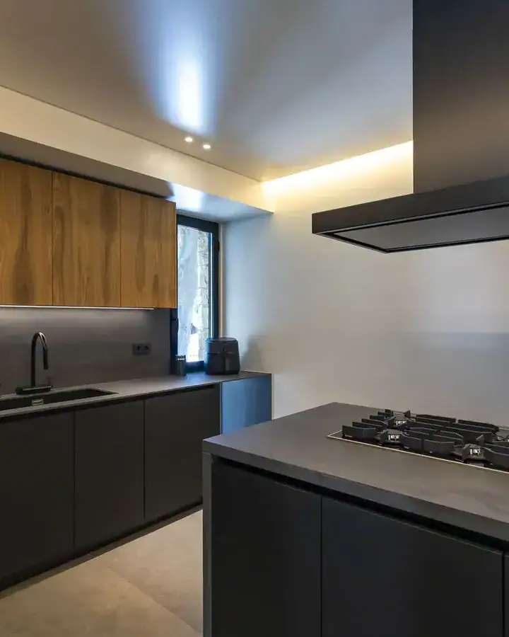 Graphite kitchen with a wood wall unit, Rachana