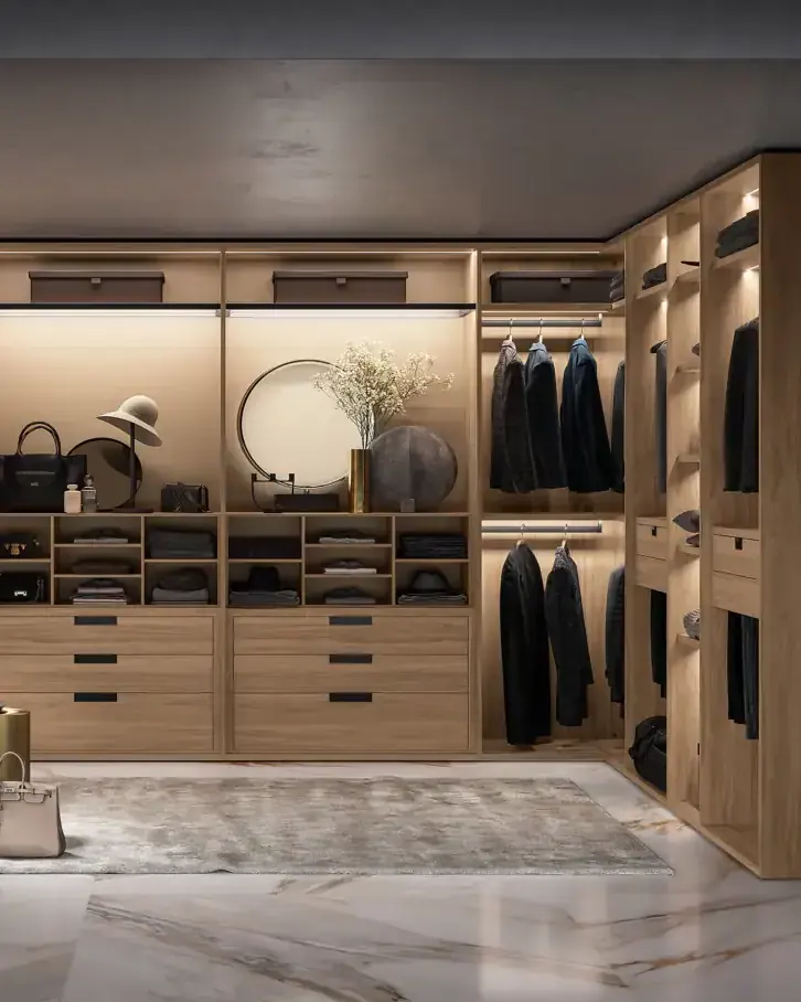 Walk-in closet with lit wood shelving