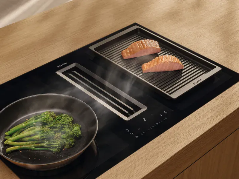 Miele induction hob with integrated downdraft extractor